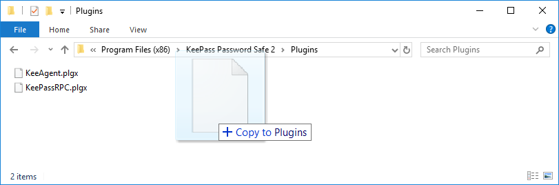screenshot of Windows Explorer showing dropping a file into the KeePass 2.x Plugins directory